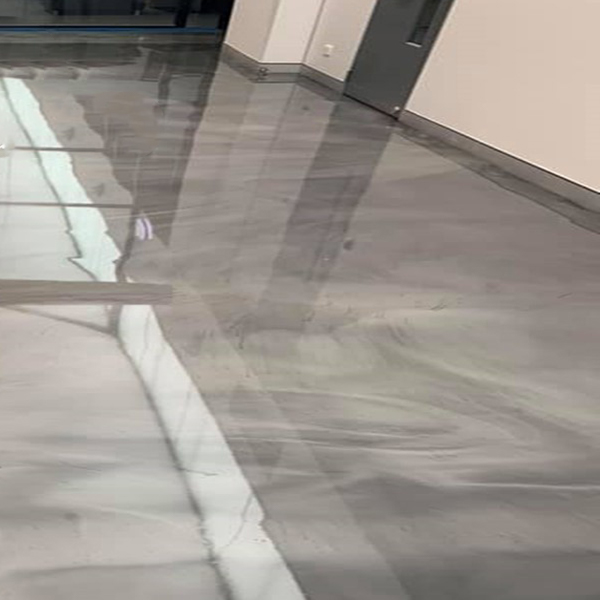 Grey, high-gloss epoxy art flooring - concrete transformation by Home Concrete Transformers